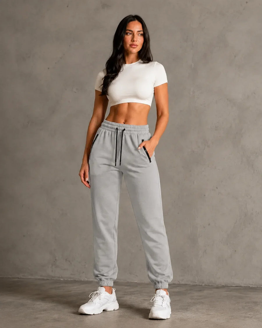 JOGGER CON CIERRE DAMA GRIS CLARO