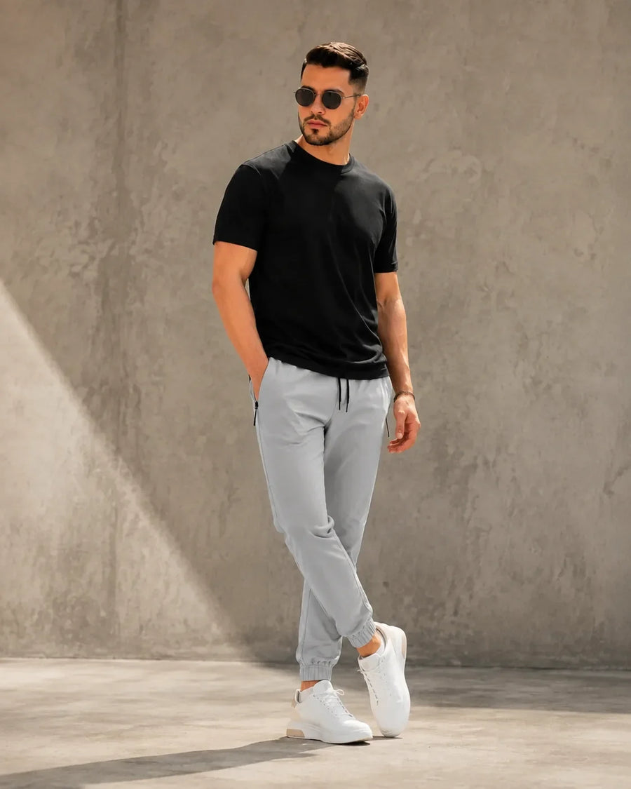 JOGGER CON CIERRE GRIS CLARO